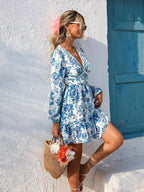 Full Size Floral Print V-Neck Long Sleeve Ruffle Hem Mini Dress Plus Size