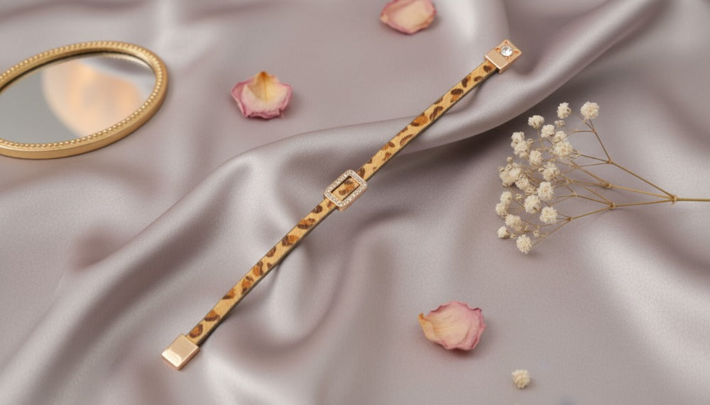 Leopard-Print Bracelet With Sparkling Gold Accents.