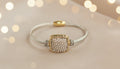 Cable-Style Bracelet with a Crystal-Studded Gold Centerpiece