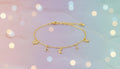 Gold Charm Bracelet with Tiny Sparkling Pendants