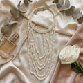 Cascading Multi-Strand Pearl Necklace with Silver-Tone Clasp