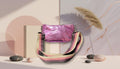 Metallic Pink Crossbody Bag with Wide Striped Shoulder Strap