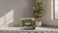 Black Textured Handbag with Gold Chain Accents