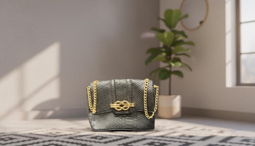 Black Textured Handbag with Gold Chain Accents