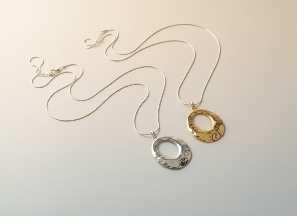 Dual Tone Sculpted Pendant Necklace
