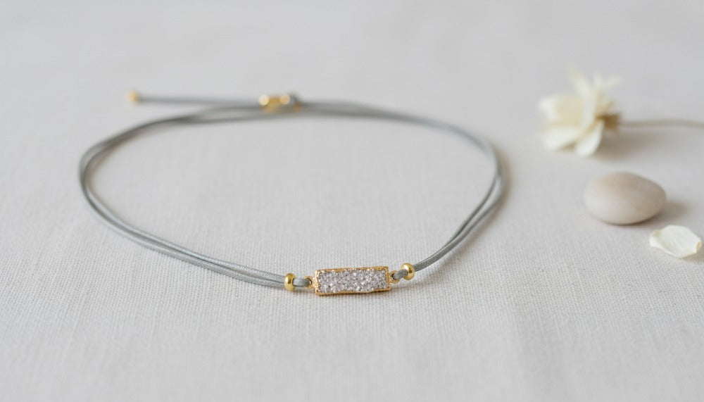 Cord Necklace with a Gold and Crystal Charm