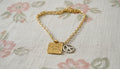 Gold Chain Bracelet with Peace Charms