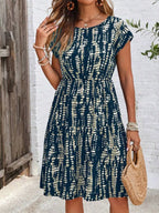 Plus Size Printed Long Sleeve Ruffle Hem Mini Dress