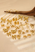 Gold Plated Hollowed Heart Bow Studded Earrings