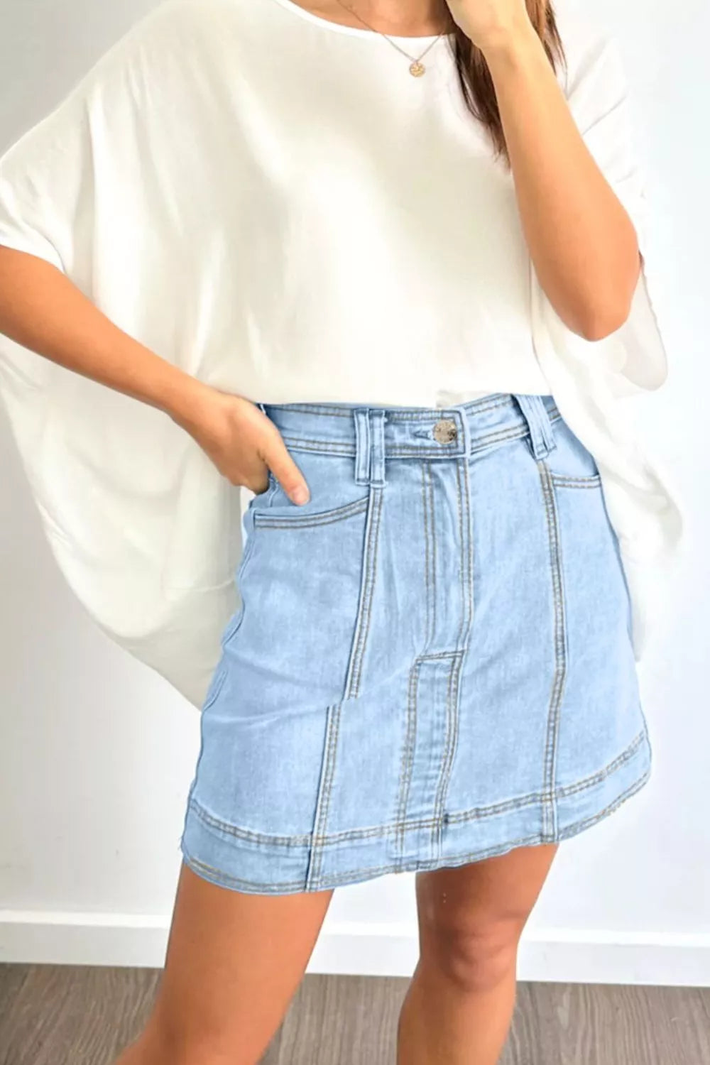 Exposed Seam Detail A-line Denim Mini Skirt with Pockets