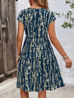Plus Size Printed Long Sleeve Ruffle Hem Mini Dress